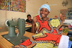 African woman sewing
